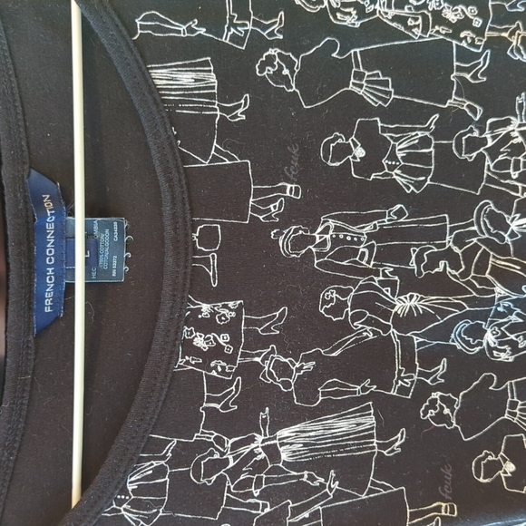 The "people shirt" black, sleeveless barely worn, tag says large, seems small - Picture 2 of 4